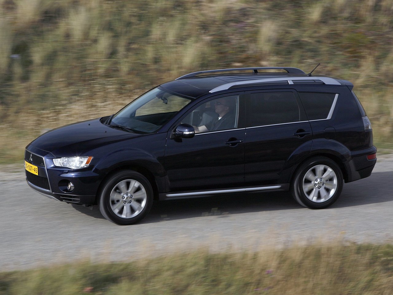 Mitsubishi Outlander II Рестайлинг (Внедорожник 5 дверей, 2009-2012)